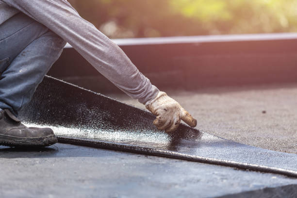 Professional Emergency Waterproofing technician working in Marshall, MI